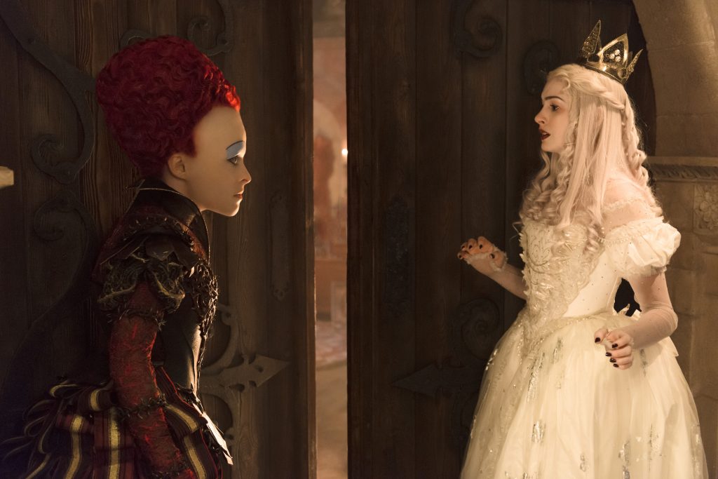 Helena Bonham Carter is the Red Queen and Anne Hathaway is the White Queen in Disney's ALICE THROUGH THE LOOKING GLASS, an all new adventure featuring the unforgettable characers from Lewis Carroll's beloved stories.
