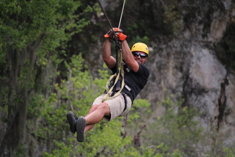 Zip Lining in Ocala Canyons in Florida in the forest with enormous lakes