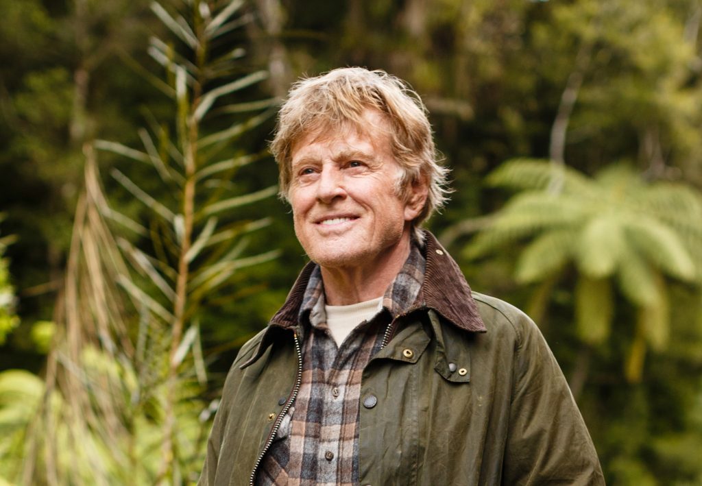 Robert Redford is Mr. Meacham, an old wood carver who delights local children with tales of the fierce dragon that resides deep in the woods nearby in Disney's PETE'S DRAGON.