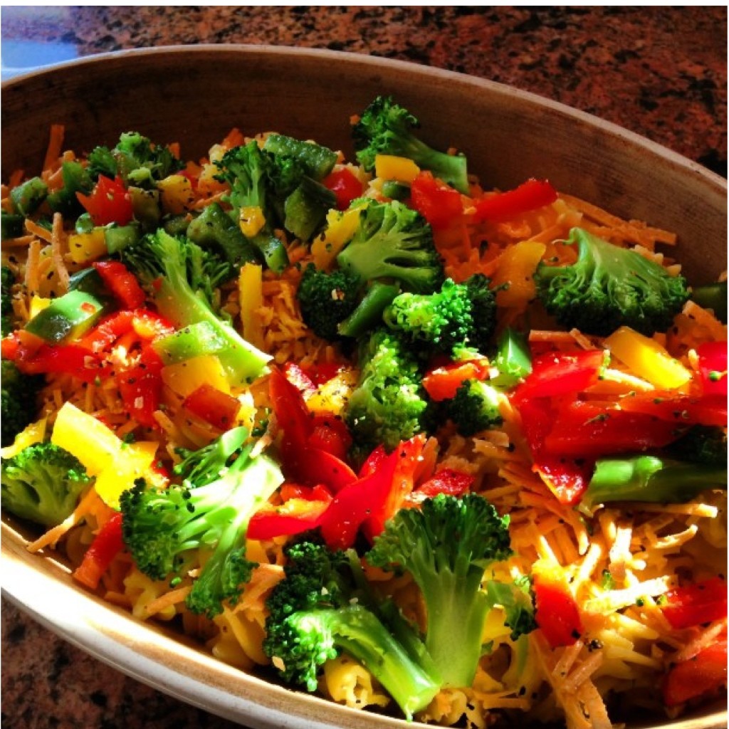 Vegan Mac and cheese. Daiya cheese on quinoa macaroni with fresh peppers and broccol