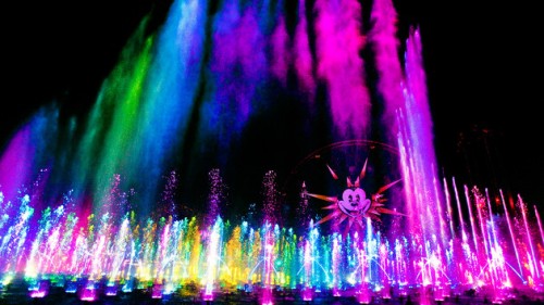 'WORLD OF COLOR' -- Lights, water, music, fire and animation come together like never before in ÒWorld of ColorÓ at Disney California Adventure park in Anaheim, Calif. The show combines nearly 1,200 powerful fountains with heights that range from 30 feet to 200 feet in the air, dazzling colors and a kaleidoscope of audio and visual effects, including both classic and new animation projected on one of the worldÕs largest projected water screens Ñ a wall of water 380 feet wide by 50 feet high for a projection surface of 19,000 square feet . Presented on Paradise Bay in Disney California Adventure park, ÒWorld of ColorÓ is a major milestone in the multi-year expansion of the park. (Paul Hiffmeyer/Disneyland)